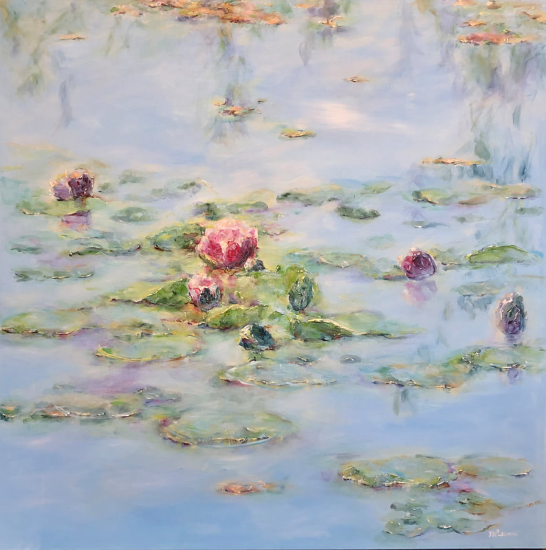 pink and purple waterlilies in a lilypond