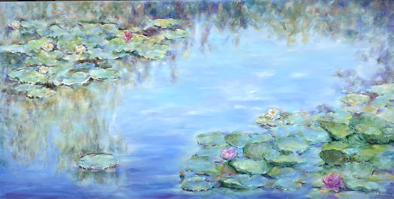 water lily pond with pink, yellow and white water lilies and reflections